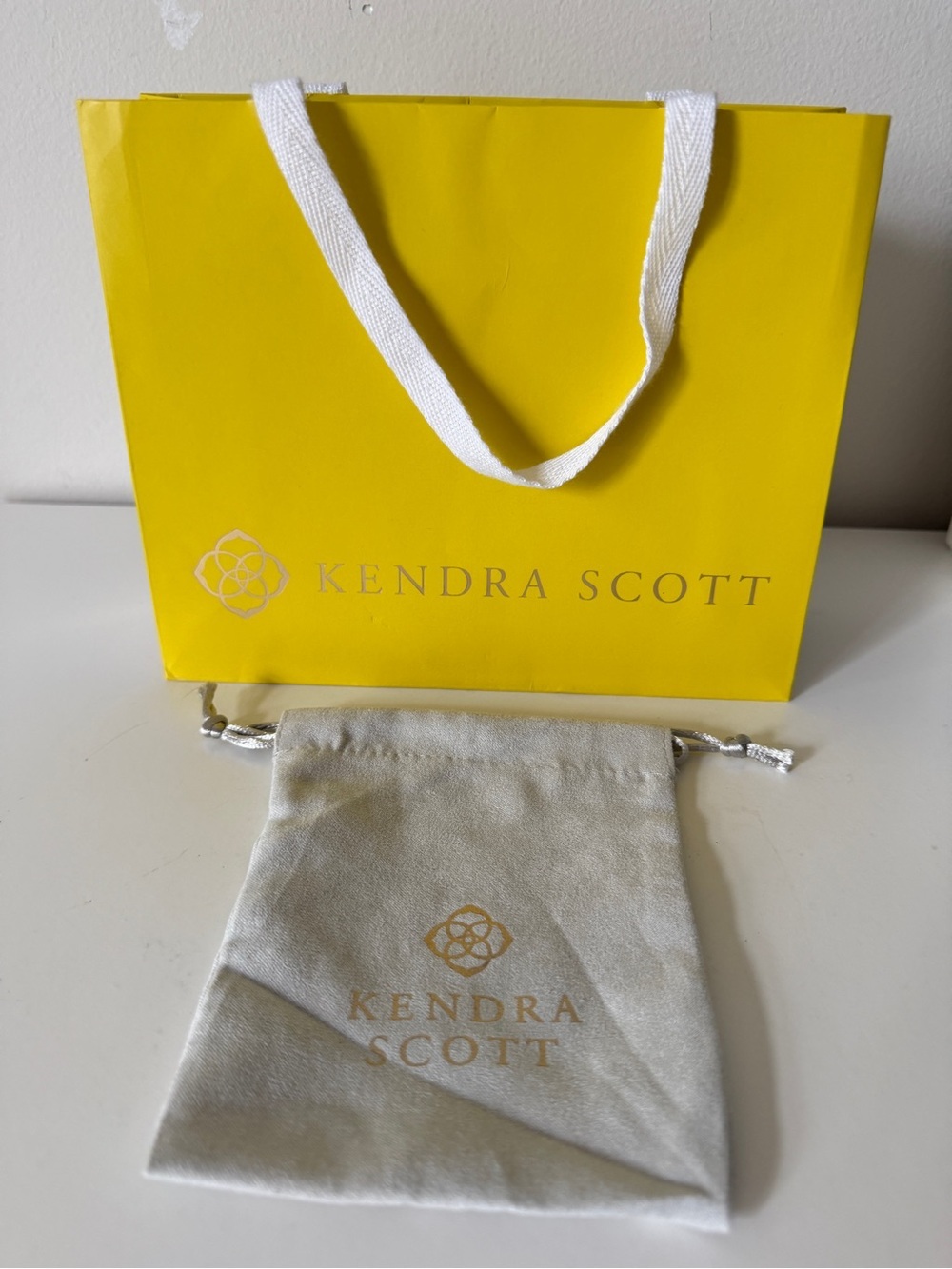 Kendra Scott Cream Drawstring Jewelry Pouch with Gold Logo
